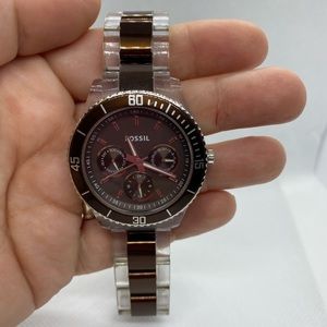 Women’s Fossil watch. Brown metal, clear acrylic
